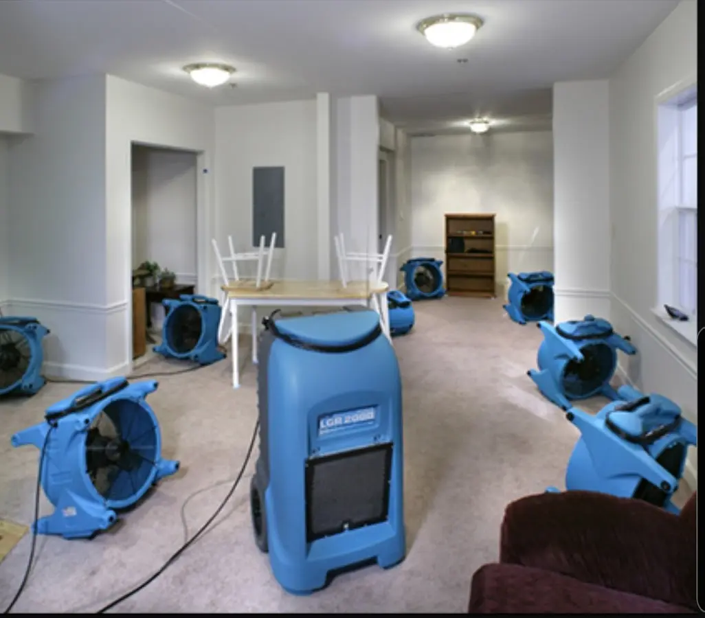 Air movers and dehumidifier setup for Water Extraction & Removal in Bridge City